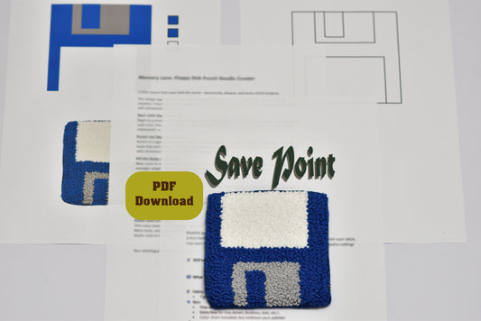 Punch needle coaster with floppy disk design and 'Save Point' text on a printed document background.