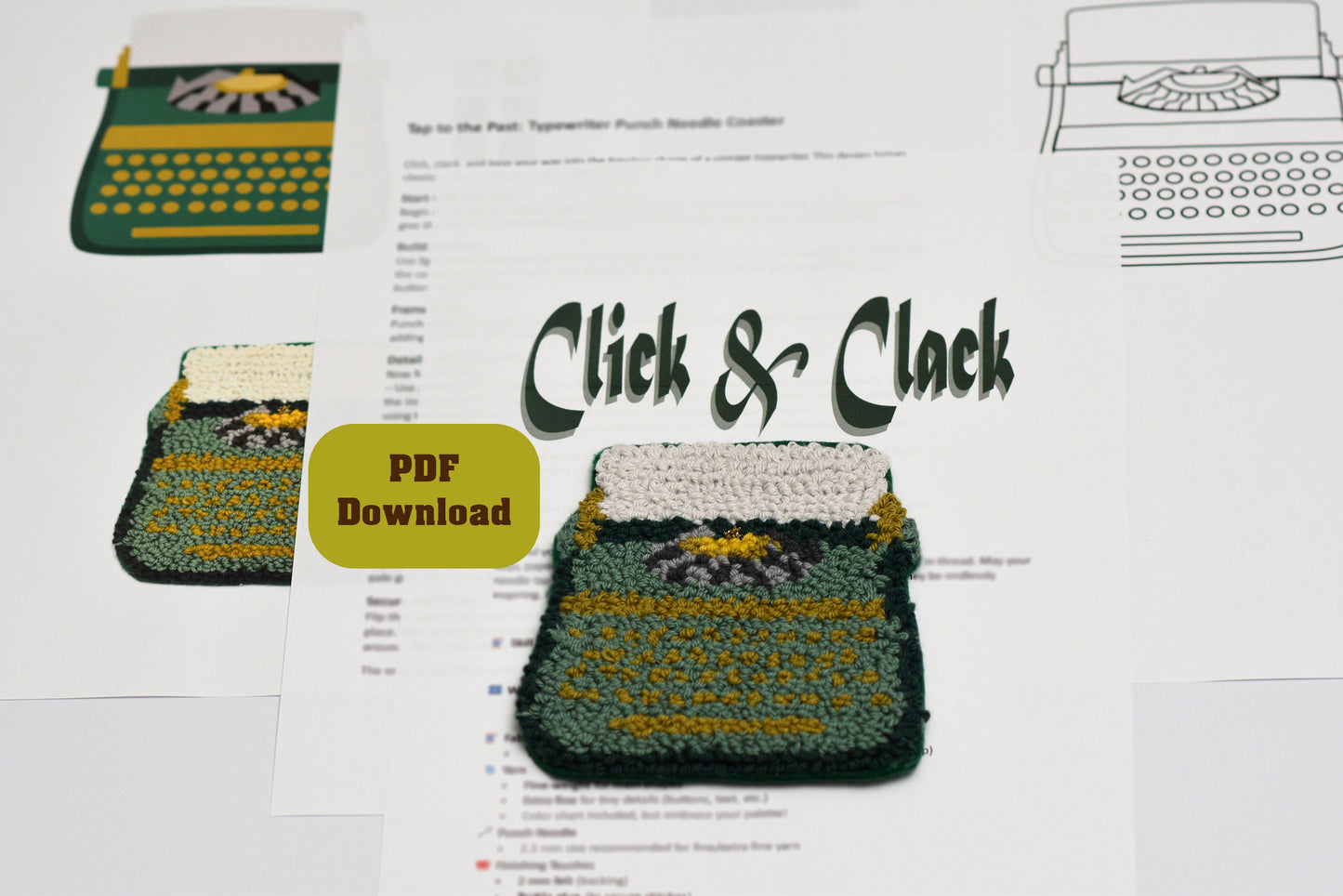 Punch needled typewriter shaped coaster with 'Click & Clack' text on a printed pattern sheet.