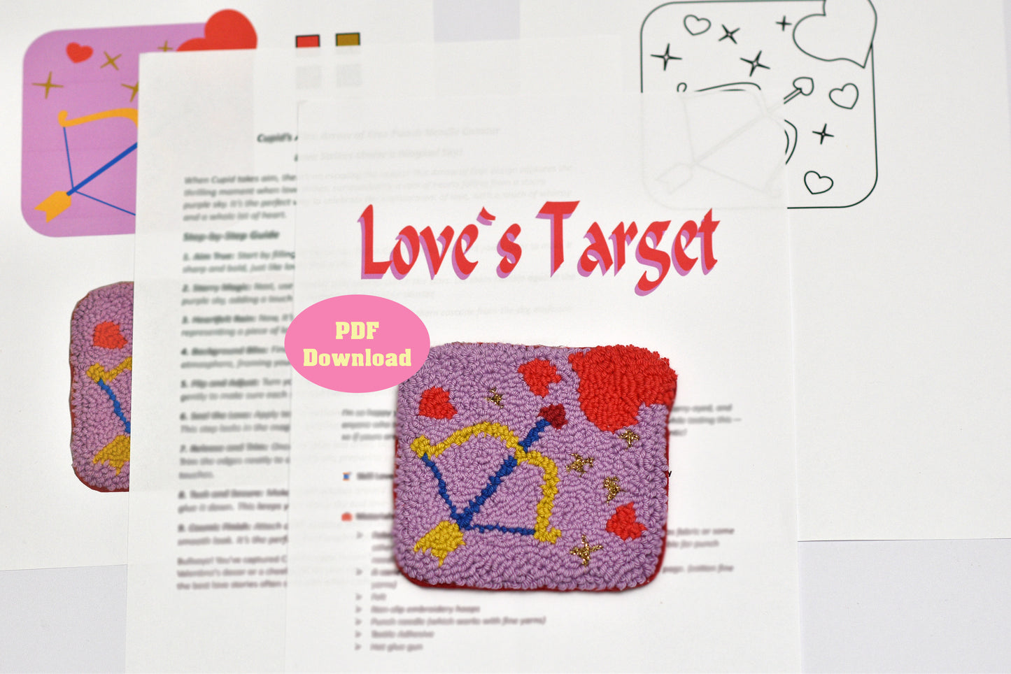 Embroidered pouch with 'Love's Target' design on a printed pattern sheet.