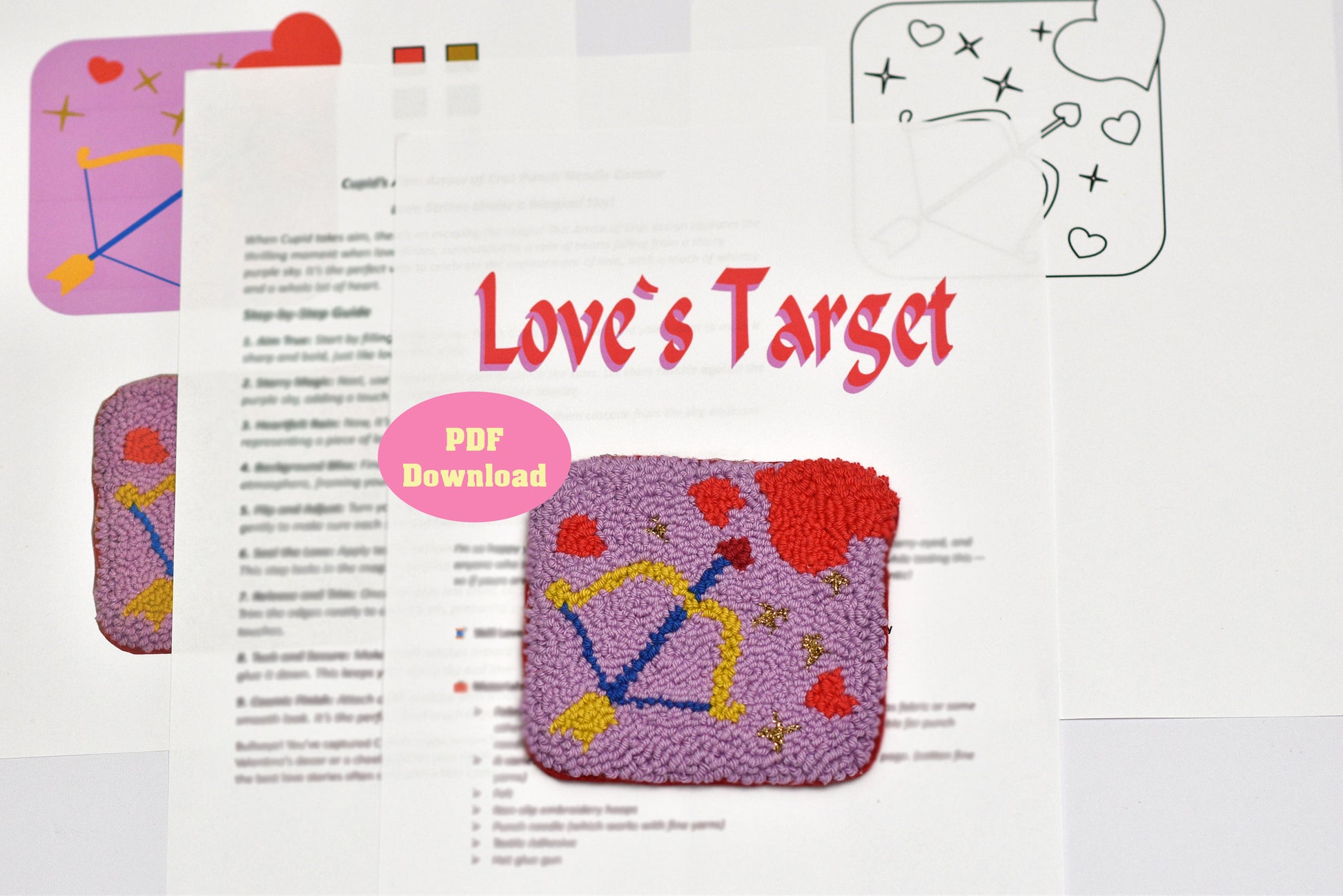 Embroidered pouch with 'Love's Target' design on a printed pattern sheet.