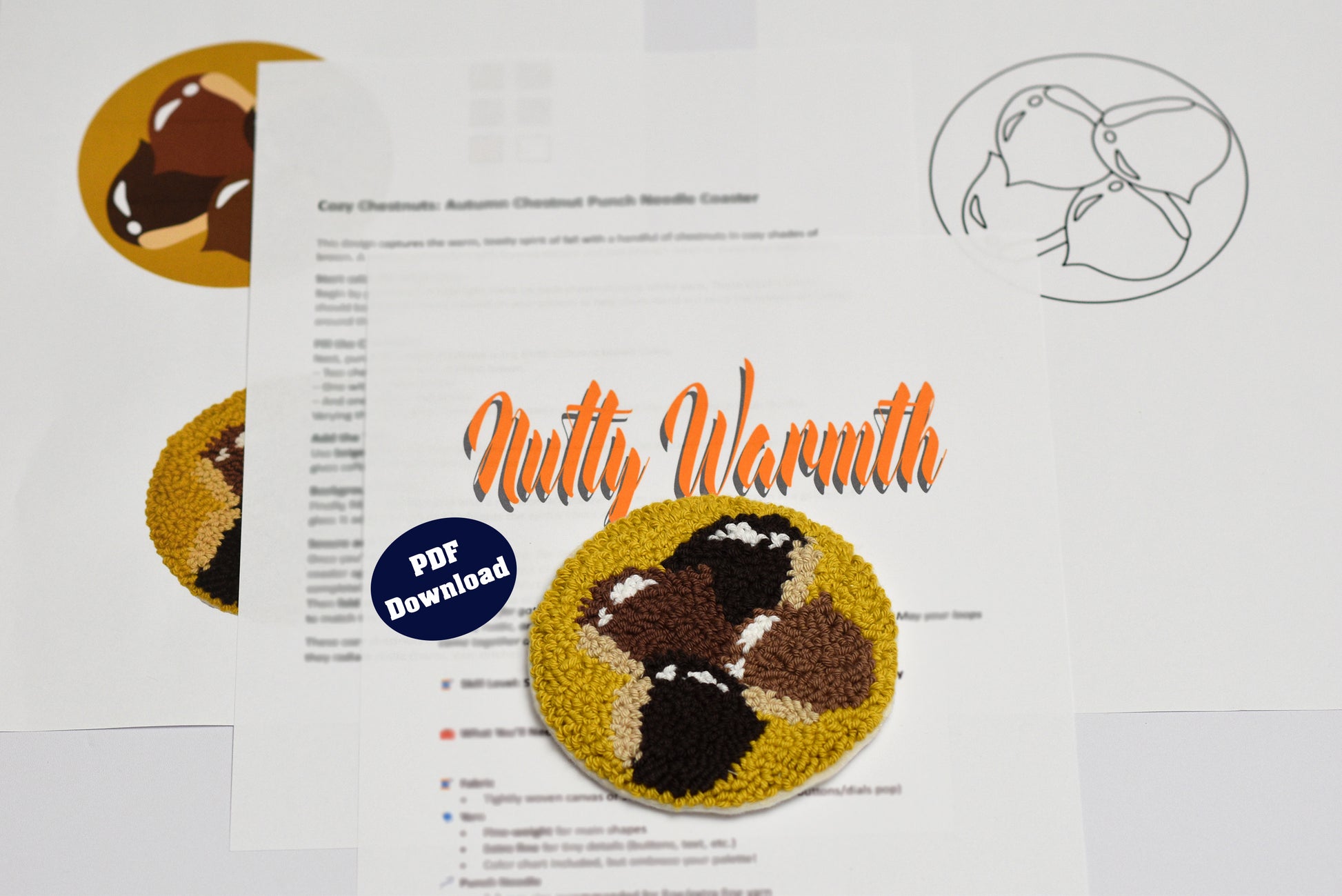 Embroidery coaster project with 'Nutty Warmth' text and images of chestnuts on a white background