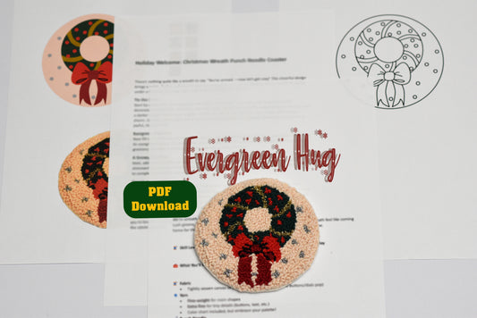 Christmas-themed punch needle coaster with wreath design and 'Evergreen Hug' text on a white background.