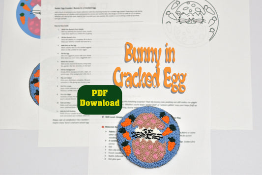 Embroidery pattern with 'Bunny in Cracked Egg' design and PDF download text on a white background.
