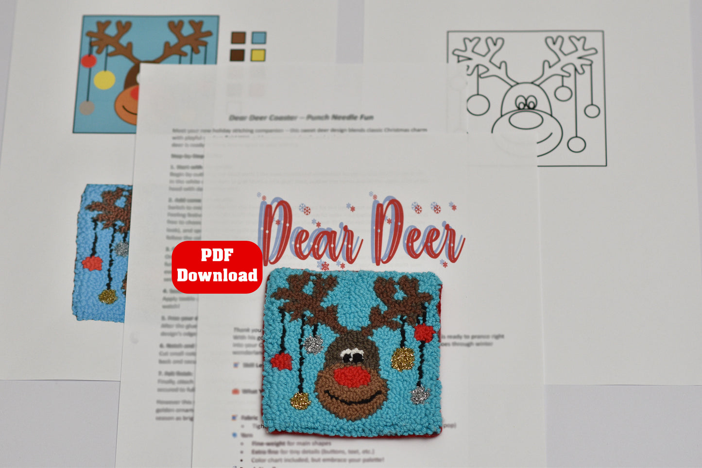 Embroidery coaster pattern with a reindeer design and PDF download button on a white background