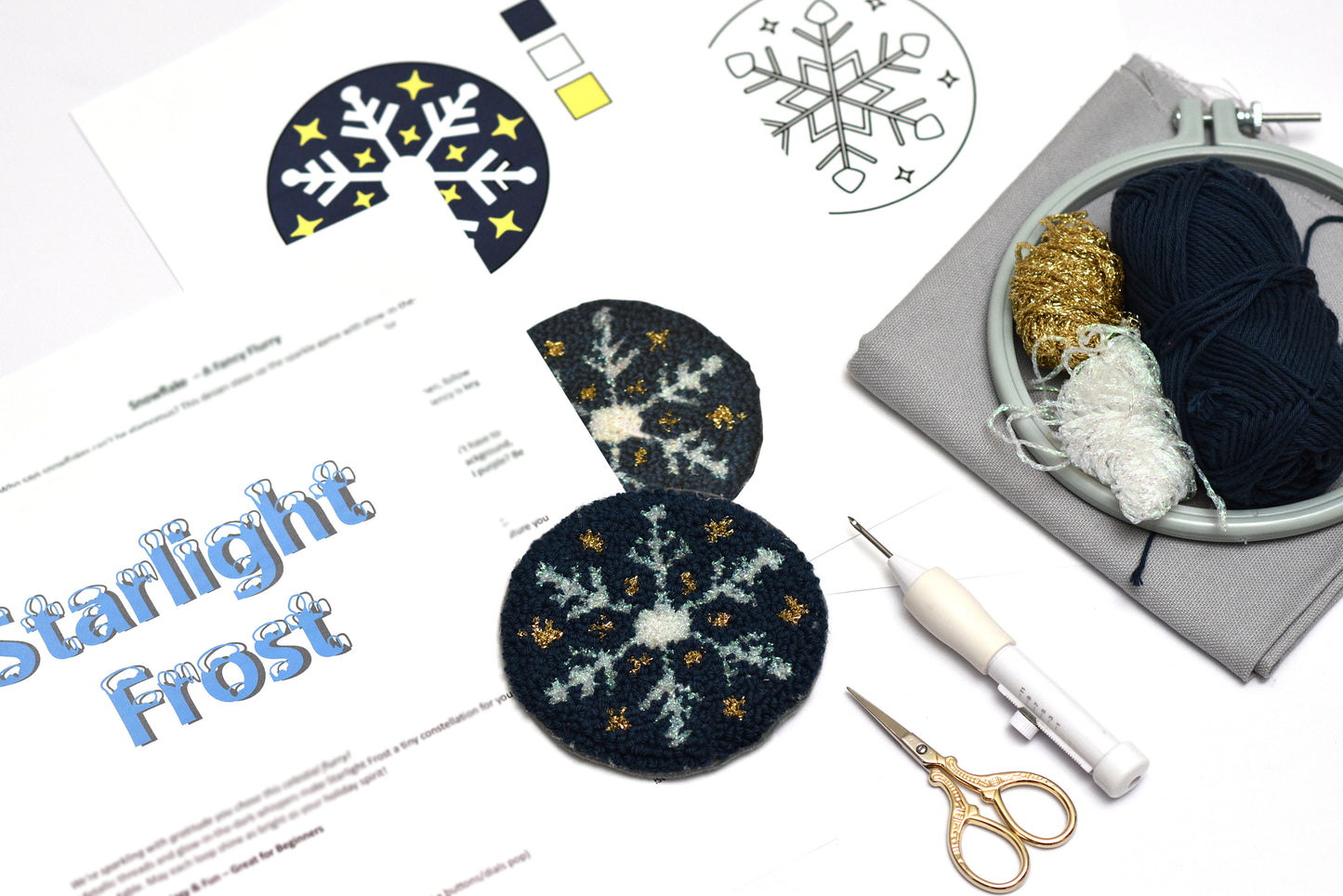 Embroidery coaster kit with starlight design, yarn, scissors, and a candle on a white background.
