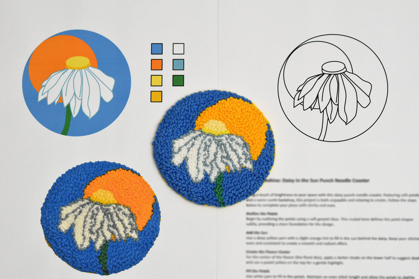 Two embroidered daisy flowers coaster with a color chart and line drawing on a white background