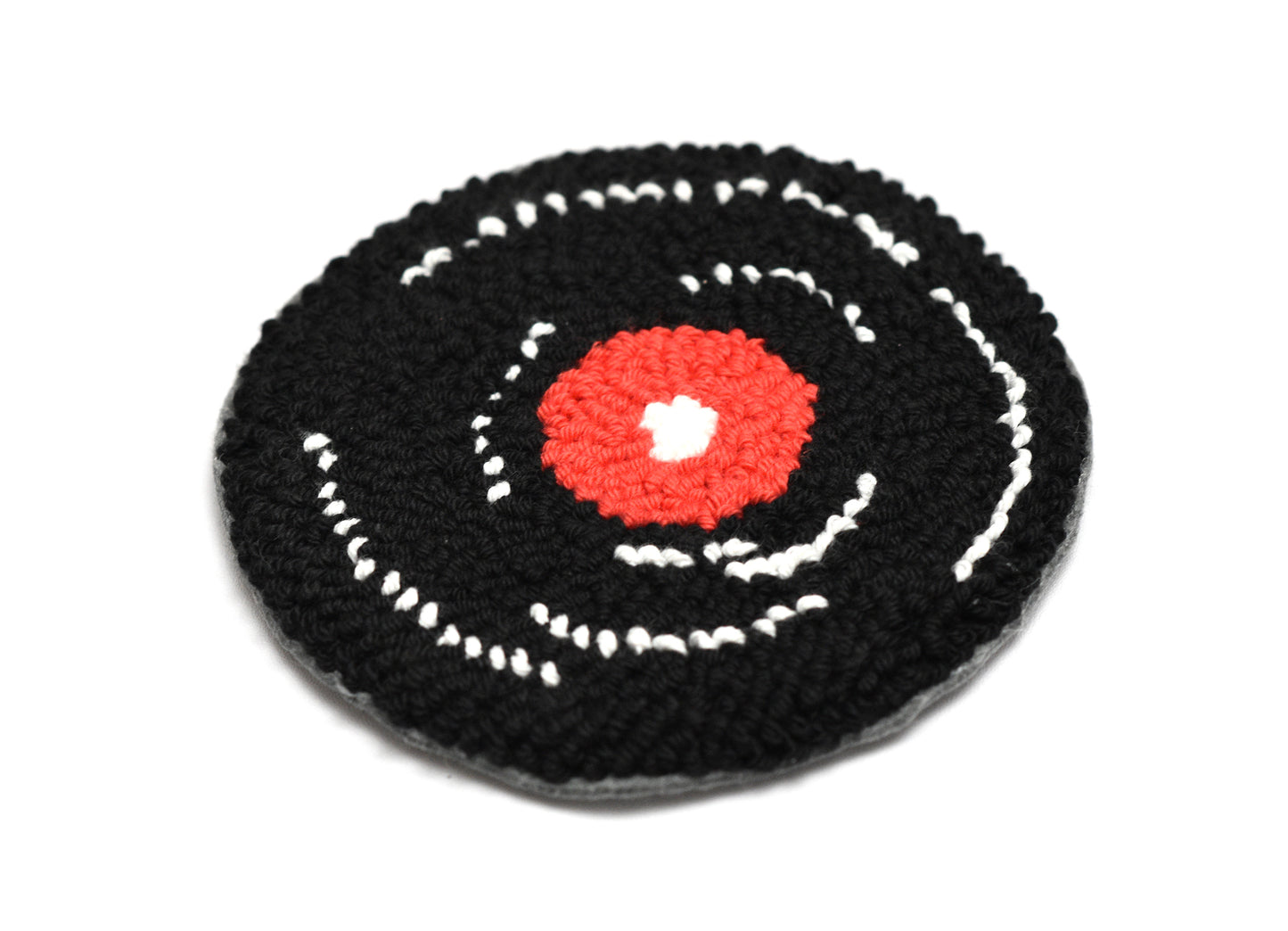 punch needled Vinyl record player coasters with a red center on a white background