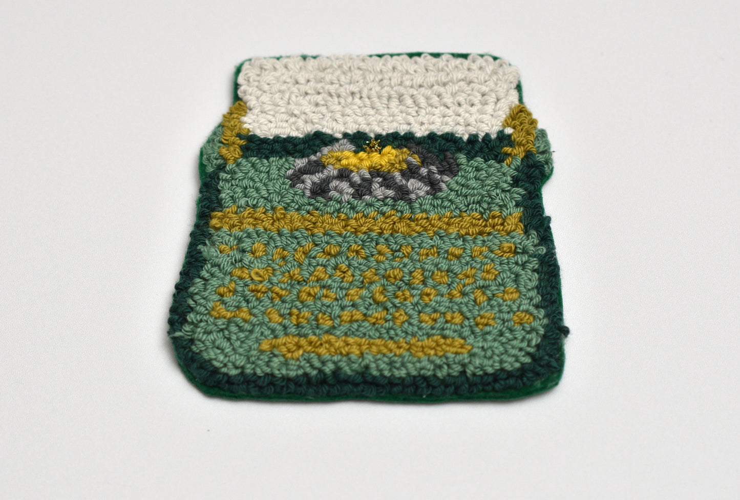 Embroidered typewriter on a white background