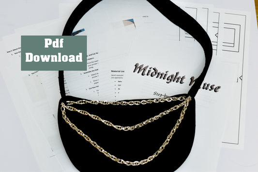 Black bag with gold chains on a white background with digital download pdf pattern overlay