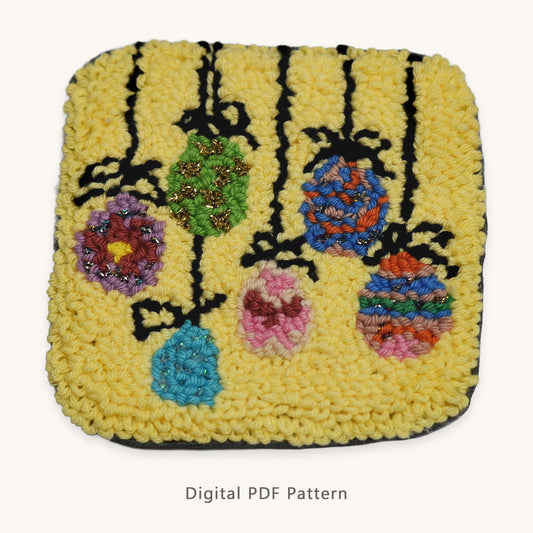 Punch needle Easter egg coaster digital PDF pattern featuring colorful hanging eggs on black branches over a yellow background, square handmade design for spring decor