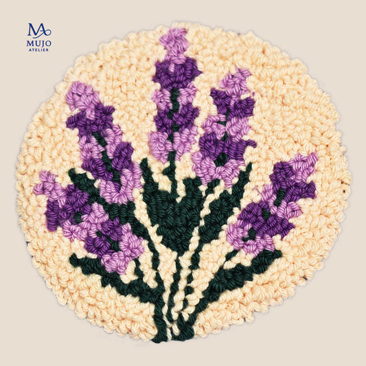 Punch needle lavender bouquet pattern featuring purple lavender flowers and dark green stems on a warm cream background.