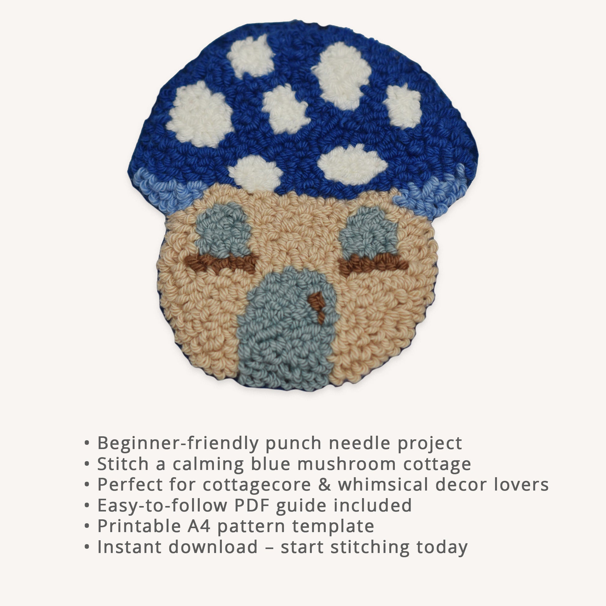 Blue mushroom house punch needle coaster PDF pattern with beginner-friendly instructions, printable A4 template, and instant digital download. Whimsical cottagecore punch needle project featuring a cozy blue mushroom cottage with soft grey windows and door.