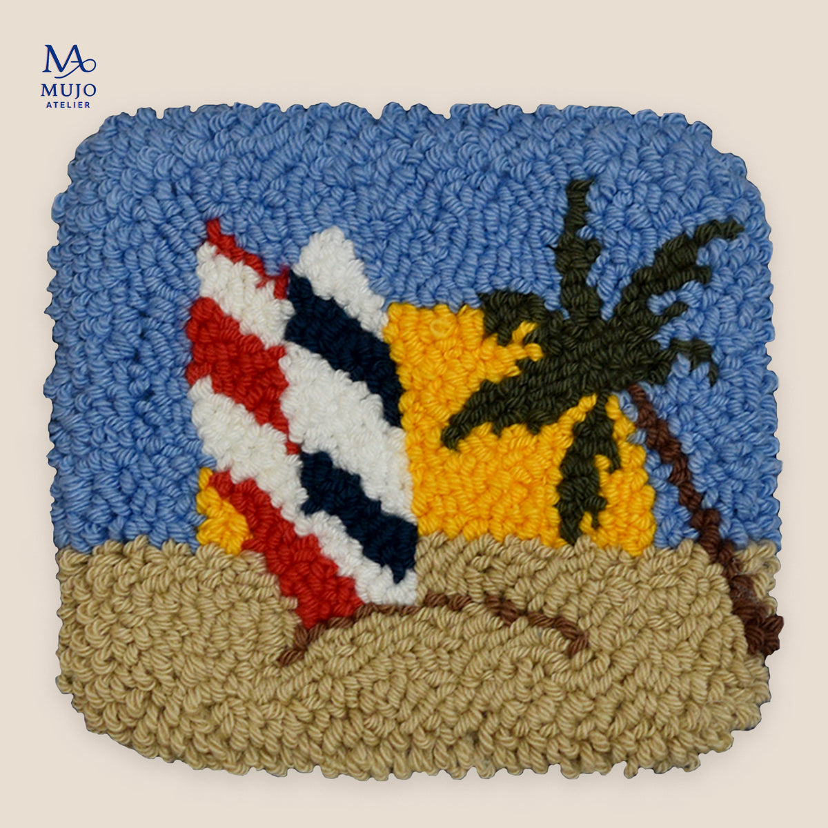 Punch needle coaster pattern featuring striped surfboards in the sand, a palm tree and bright yellow sun against a blue summer sky.