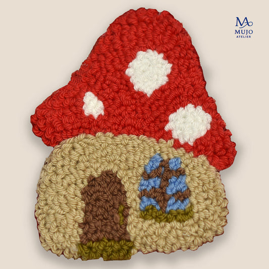 Punch needle mushroom house coaster pattern PDF with red mushroom roof, beginner-friendly digital embroidery pattern by Mujo Atelier.